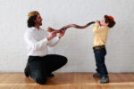Father and son with Shofar, Yom Kippur father_and_son_with_shofar_web_large