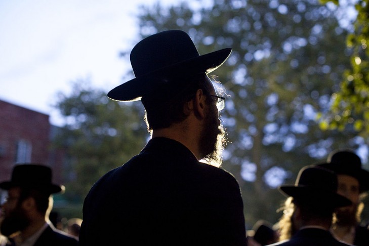 Hasidic men wait for a procession (Photo by Ramin Talaie/Getty Images)