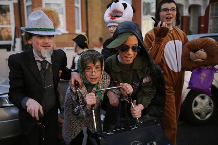 Costumed children celebrate Purim in London (Photo by Dan Kitwood/Getty Images)