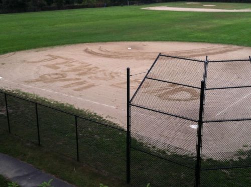 The message “Jews did 9/11” was inscribed in the dirt of the softball field at Marblehead High School last week. (MARBLEHEAD POLICE)