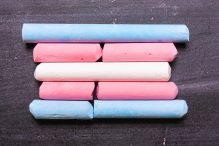 Transgender flag in chalk (Photo: Alexmia/iStock)