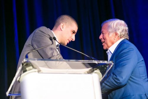 New England Patriots' owner Robert Kraft (right) likes to win, and—when it comes to Israeli-Palestinian co-ventures—he's confident he has a winner in Ohad Elhelo (left). The men are pictured here at the podium during a 2014 fundraiser. (Photo credit: Nir Landau)