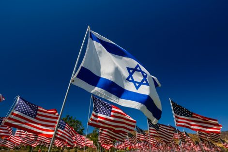 Israeli Flag flying in a field of American Flags AIPAC (Photo: P_Wei/iStock)