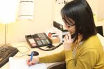 Immigration Legal Services staff attorney Jill K. Hwang working in her office. (Courtesy Catholic Charities)