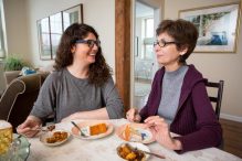 Gabriella Gershenson and her mother, Anna, eat Passover sponge cake at Anna’s home in Pittsfield. The recipe was a favorite of Gabriella’s grandmother. (MATTHEW CAVANAUGH FOR THE BOSTON GLOBE)