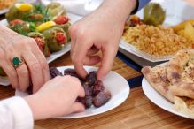 Breaking the fast with food (Photo: gmutlu/iStock)