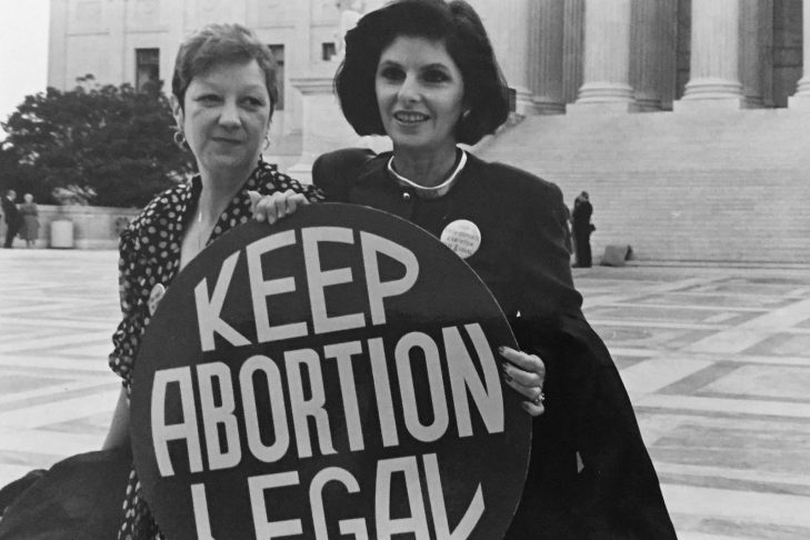 Norma McCorvey (Jane Roe) and her lawyer Gloria Allred on the steps of the Supreme Court in 1989 (Photo: Lorie Shaull)