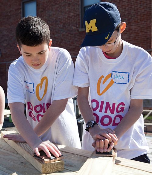 Last year, volunteers Jared Kasten and Nate Samuels helped build picnic tables.