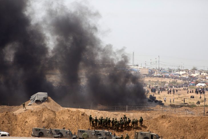 Israeli soldiers take positions as Palestinians gathered for a protest on the Israel-Gaza border on April 13, 2018, in Netivot, Israel. (Photo: Getty Images/Lior Mizrahi)