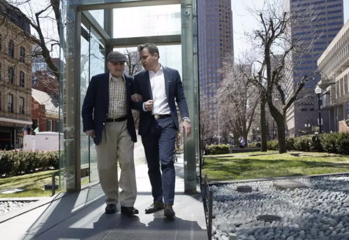 REFERRAL: Steve Ross (left), founder of the New England Holocaust Memorial, walks through the memorial with his son, Mike. (JESSICA RINALDI/GLOBE STAFF)