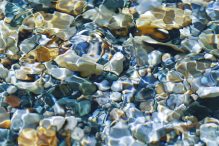 The sun shone through the stream on the pebbles. (Photo: iStock/undefined)