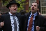 BOSTON, MA - APRIL 28:   Rabbi Hirschy Zarchy of Chabad Harvard and Rabbi Marc Baker, president of Combined Jewish Philanthropies, sing "Am Yishrael Chai" during a vigil for the victims of the shooting at Chabad of Poway in California at the New England Holocaust Memorial on April 28, 2019 in Boston, Massachusetts. (Staff Photo By Angela Rowlings/MediaNews Group/Boston Herald)