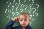 Child thinking with question marks (Photo: BrianAJackson/iStock)