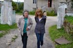 Judy Favish, granddaughter of Feiga Shamis, walks with LeeAnn Dance through the Ukrainian city of Vyshnivets (Courtesy photo)