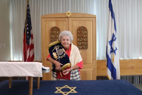 Shirley Sowsy 91 Bat Mitzvah holding a Torah