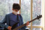 Rashi Middle Schooler playing the guitar