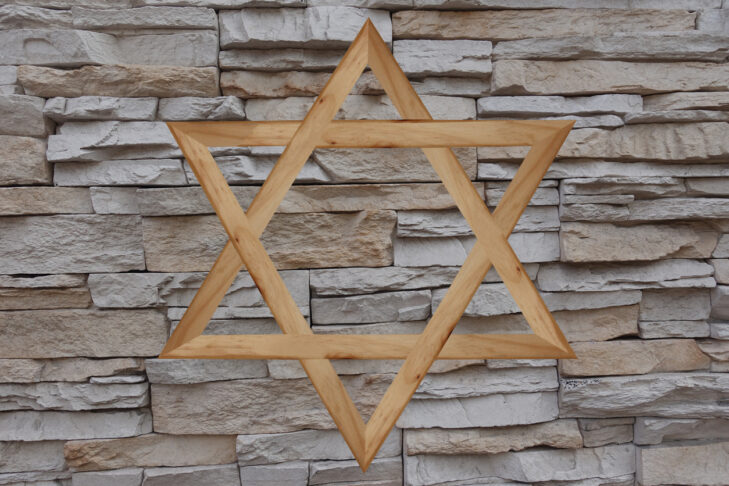 Star of David fixed on a stone wall of a synagogue
