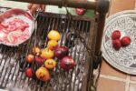 Grilled stone fruits with rosemary and rose syrup from “Chasing Smoke: Cooking Over Fire Around the Levant” by Sarit Packer and Itamar Srulovich (Photo: Patricia Niven)