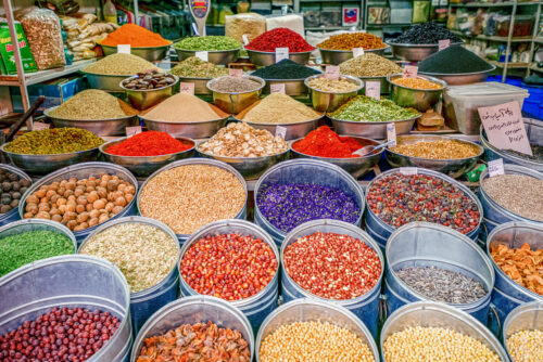 10/05/2019 Kerman,Kerman ProvinceIran, a huge variety of spices and herbs on a counter on a traditional Iranian eastern bazaar