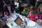 Young families participating in craft projects