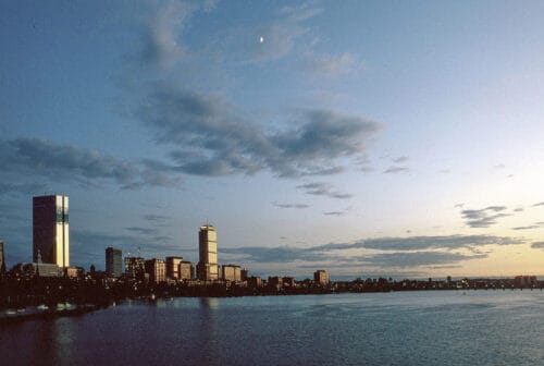 Prudential & John Hancock Buildings reflect sunset over Charles River, Boston, Massachusetts, 1976. (Photo by Spencer Grant/Getty Images)