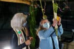 Shakingn the lulav and etrog in the Temple Israel Sukkah