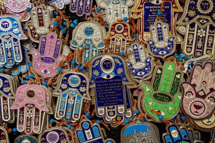 A pile of colorful Hamsa blessings.
