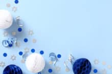 Yom Ha'atzmaut Haatzmaut concept, Star of David, Celebration, Party, Israeli Independence Day Yom Haatzmaut, Israel Independence Day banner template. Flat lay festive Jewish decorations on blue background.