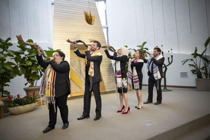 Temple Israel clergy blowing the shofar