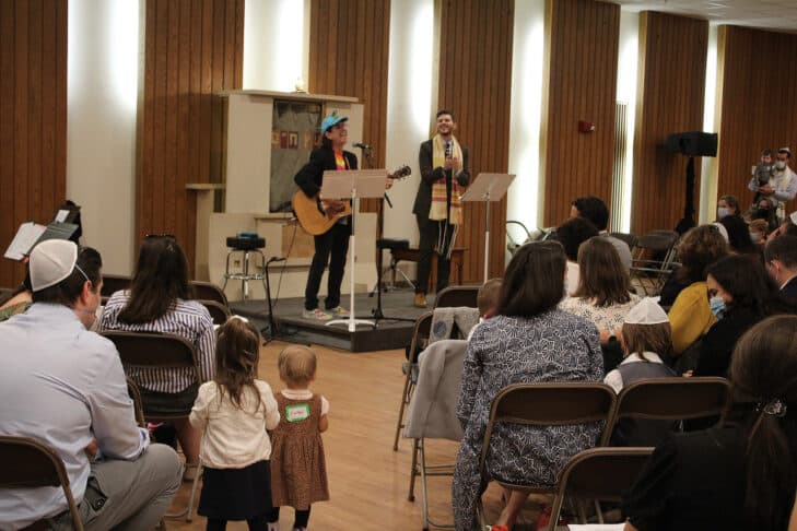 Musician Wayne Potash and Rabbi Andrew Oberstein leading a Young Family High Holy Day service at Temple Israel
