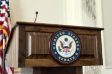 Washington D.C, USA – January 18, 2017: The United States Senate podium in the Washington D.C. capitol building also known as Capitol Hill.  The podium is where U.S. senators speak about upcoming bills and hearings, but the podium is empty because congress is not in session due to the inauguration of Donald J Trump for US president.