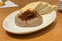 Refferal Use Only. Executive chef Noah Clickstein of Lehrhaus, a Somerville tavern serving Jewish cuisine, shared his favorite family holiday recipe with us: chopped liver. (Photo courtesy of Noah Clickstein)