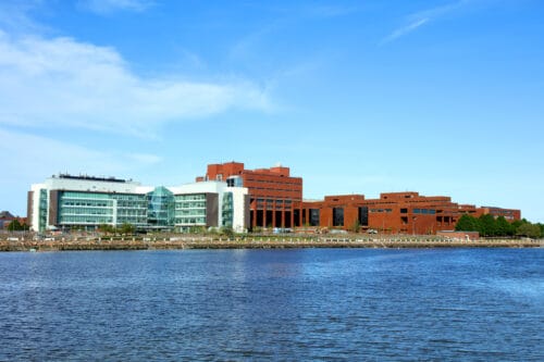 Boston, Massachusetts, USA - May 21, 2017: Daytime view of the University of Massachusetts Boston campus along the Boston Harborwalk