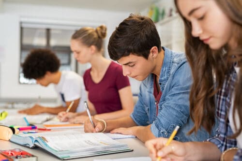 Teens High School Students Studying Education Classroom