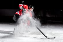 Man playing ice hockey Ice Hockey Stick Puck