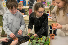 Epstein Hillel School students potting succulent plants for elderly residents at Chelsea Jewish Lifecare on Mitzvah Day