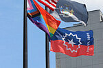United States Flag, New York State Flag, LGBTQIA+ Pride Flag, Juneteenth Flag, Adam Clayton Powell Jr