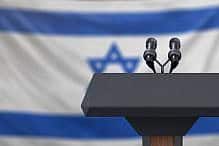 Israel Flag and Microphone (Photo: iStock/Derek Brumby)