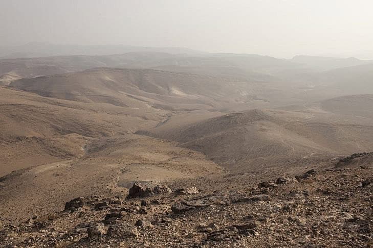 Rocky desert landscape background. Rocky desert hills background in the Negev Desert, Israel, Middle East.