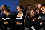cropped Young adults chatting at a High Holy Day service