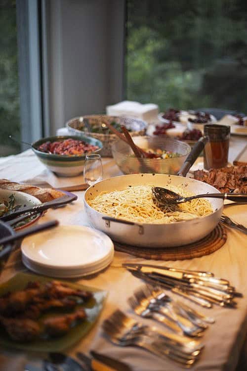 Potluck Lunch Dinner Table Linda Raymond iStock