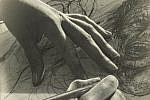 HBI exhibit (1200 x 800 px) Two hands on a piece of paper, a pen in one hand, in the act of drawing a face of a person with an open mouth and wide eyes.