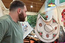 Yuval Gur and Shirah Rubin with Sandra Mayo embroidery for Malegria Yuval Gur and Shirah Rubin with Sandra Mayo embroidery for Malegria