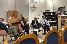 Rabbi Marc Baker speaks at an interfaith panel at Hebrew College on April 14, 2026 Rabbi Marc Baker speaks at an interfaith panel at Hebrew College on April 14, 2026