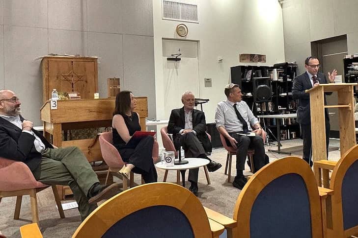 Rabbi Marc Baker speaks at an interfaith panel at Hebrew College on April 14, 2026 Rabbi Marc Baker speaks at an interfaith panel at Hebrew College on April 14, 2026