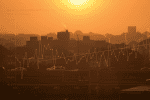 Climate Conversations: Visual Notes on a Changing Planet JFK MBTA station on a hazy day where smog was orange-tinted and visibility was drastically reduced due to unusually hot weather (Photo by Lisa Link, 2016)