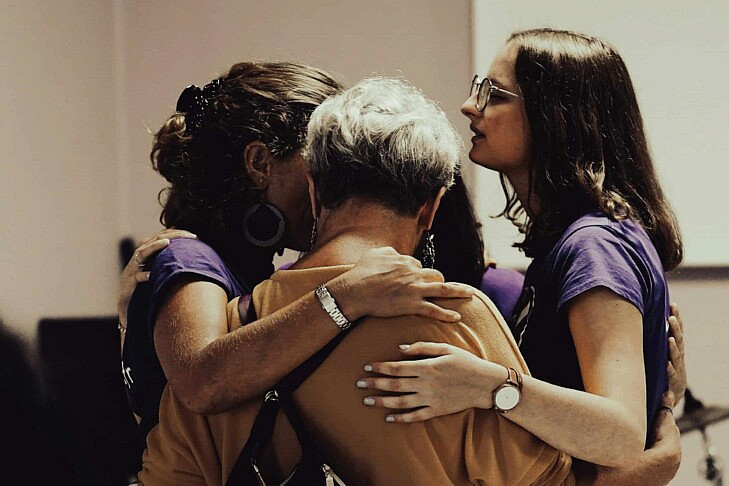 Group of women, comforting, connection Jametlene Reskp Unsplash