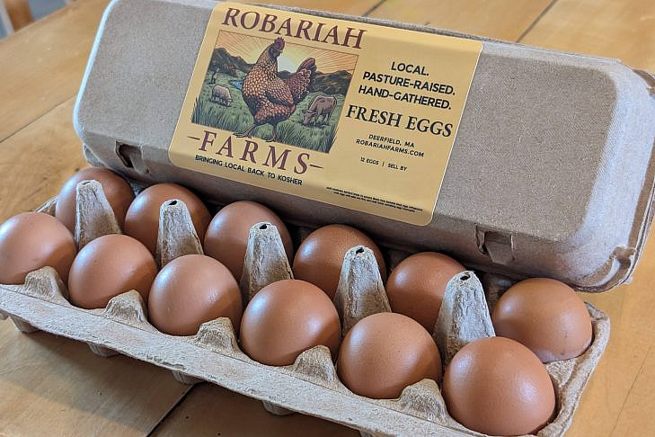 Robariah Farms Local Pasture-Raised Eggs A carton of brown eggs labeled Robariah Farms, Local, Pasture-Raised, Hand-Gathered, Fresh Eggs, Deerfield, MA.